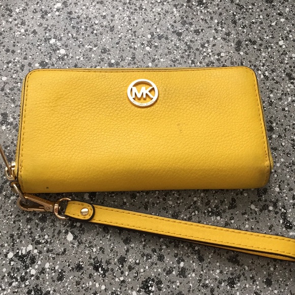 Michael Kors Handbags - Michael Kors yellow authentic leather Walet